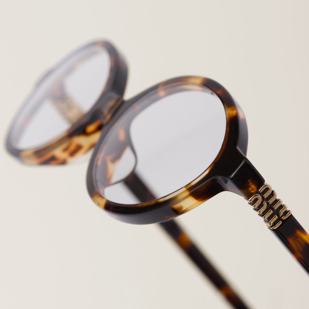 Miu Miu Oval Brown Transparent T-2