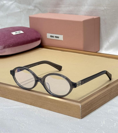 Miu Miu Oval Black Transparent T-1