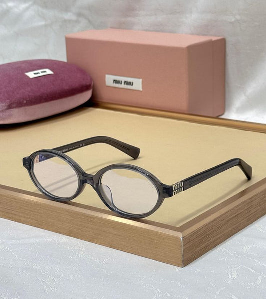 Miu Miu Oval Black Transparent T-1
