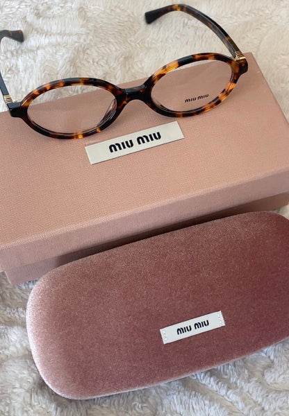 Miu Miu Oval Brown Transparent T-2