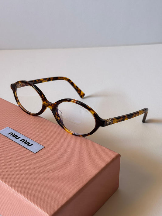 Miu Miu Oval Brown Transparent T-2